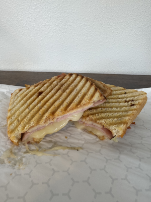 BACON + HAM + TURKEY + CHEESE + BUSSIN SAUCE ON ITALIAN WHITE BREAD